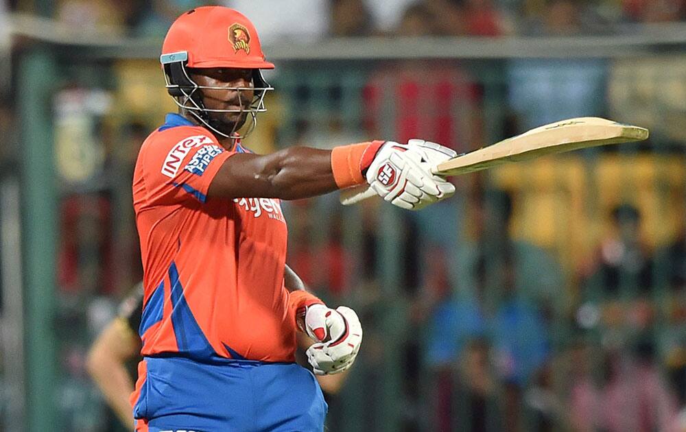 Gujarat Lions batsman Dwayne Smith celebrates his fifty runs during the 1st qualifier IPL 2016 match against Royal Challengers Bangalore at Chinnaswamy Stadium in Bengaluru.
