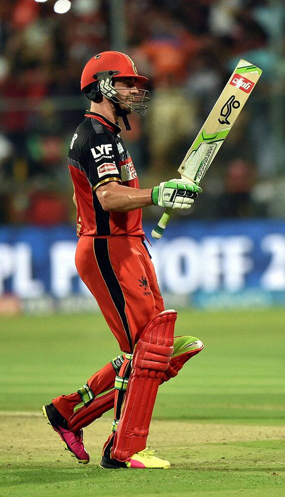 Royal Challengers Bangalores AB De Villiers celebrate after winning during the 1st qualifier IPL 2016 match against Gujarat Lions at Chinnaswamy Stadium in Bengaluru.