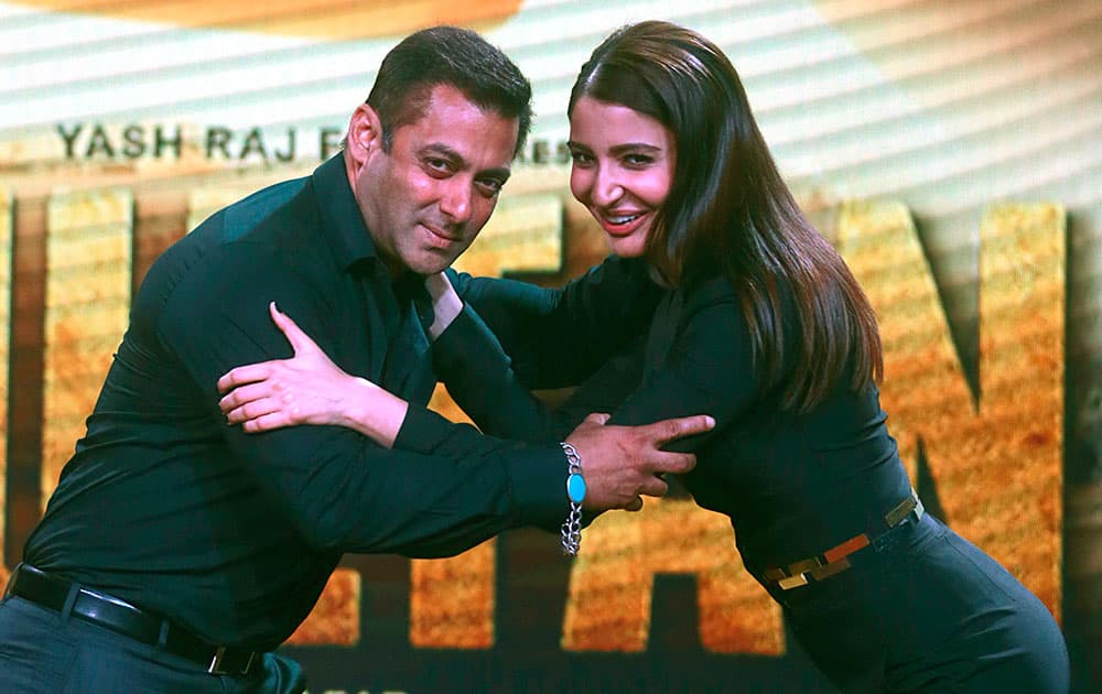 Bollywood actors Salman Khan left, along with Anushka Sharma pose for photographers, during a trailer launch of their upcoming movie ' Sultan in Mumbai.