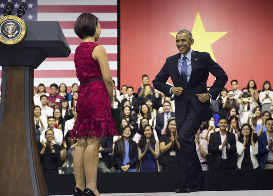 U.S. President Barack Obama is introduced by Tu Ngo, a member of the YSEALI (Young Southeast Asian Leaders Initiative) Network.