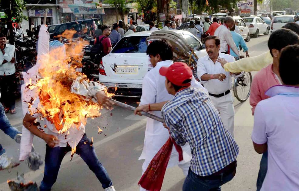 Workers of Bharatiya Janata Party and Samajwadi Party clash during a protest by the latter in Allahabad.