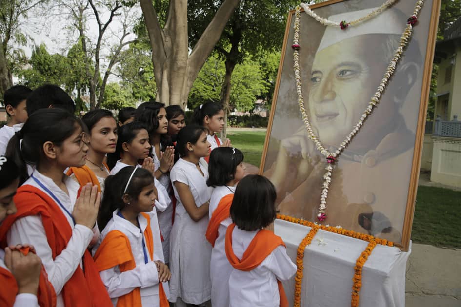 Children pay tribute at Anand Bhawan, the ancestral home of India's first prime minister Jawaharlal Nehru on his 52nd death anniversary in Allahabad.