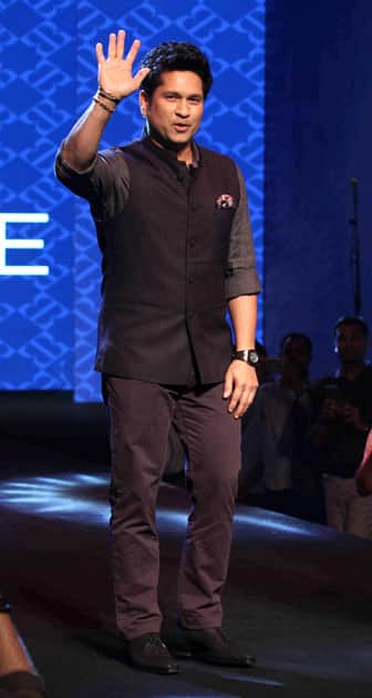 Master Blaster Sachin Tendulkar walks on the ramp to showcase the True Blue collection at the first store launch of True Blue at High Street Phoenix, Lower Parel in Mumbai.