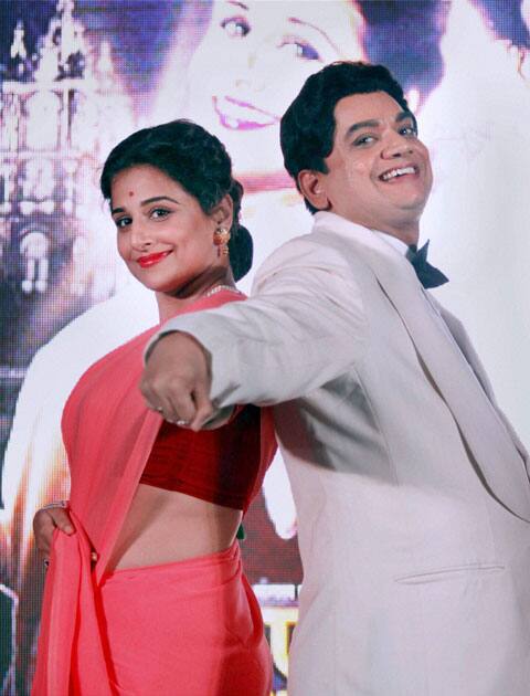 Bollywood actor Vidya Balan and Marathi actor Mangesh Desai during the launch of song Shola Jo Bhadke from Marathi film Ekk Albela, in Mumbai.