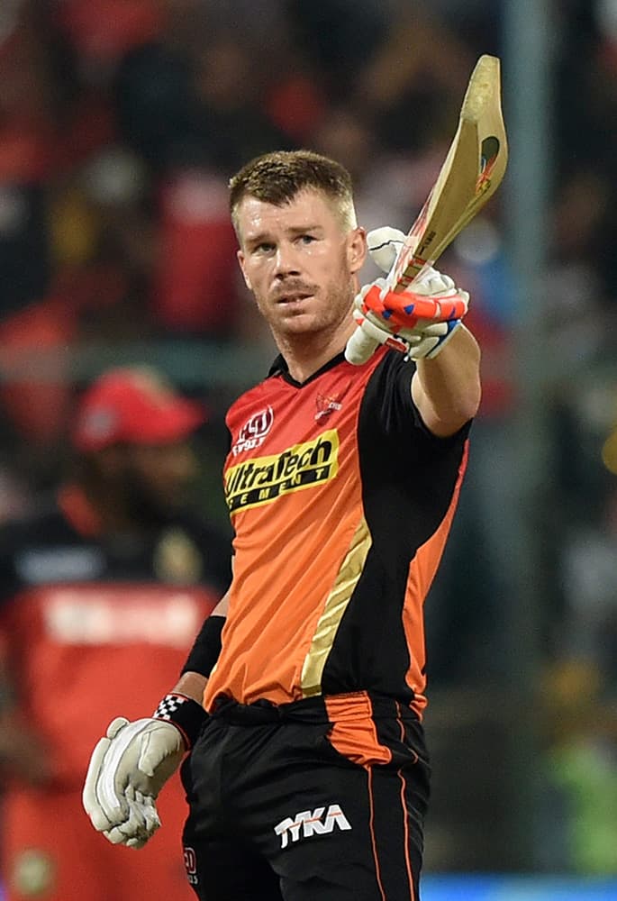 Sunrisers Hyderabad Skipper David Warner celebrates his fifty runs during the IPL 2016 Final match between Royal Challengers Bangalore and Sunrisers Hyderabad at Chinnaswamy Stadium in Bengaluru.