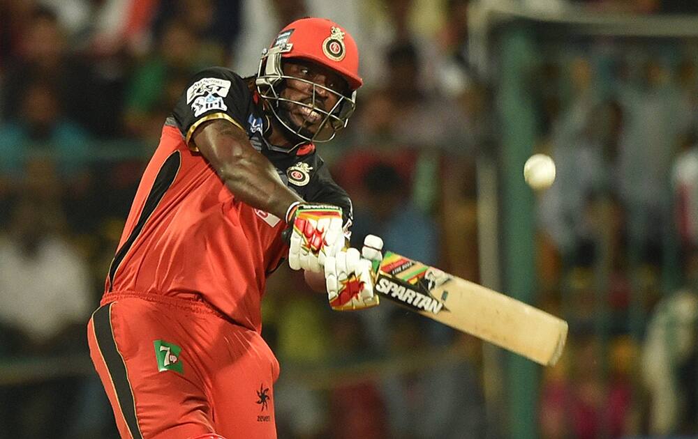 Royal Challengers Bangalores batsman Chris Gayle plays a shot during the IPL 2016 Final match between Royal Challengers Bangalore and Sunrisers Hyderabad at Chinnaswamy Stadium in Bengaluru.