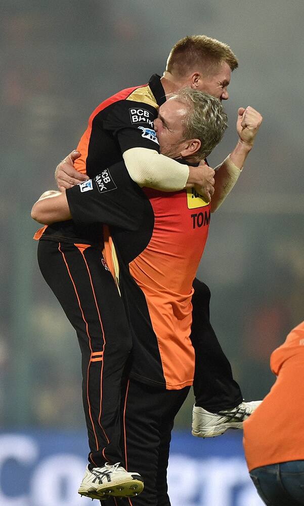 Sunrisers Hyderabad skipper David Warner and coach Tom Moody celebrate after winning the IPL 2016 Final match against Royal Challengers Bangalore at Chinnaswamy Stadium in Bengaluru.