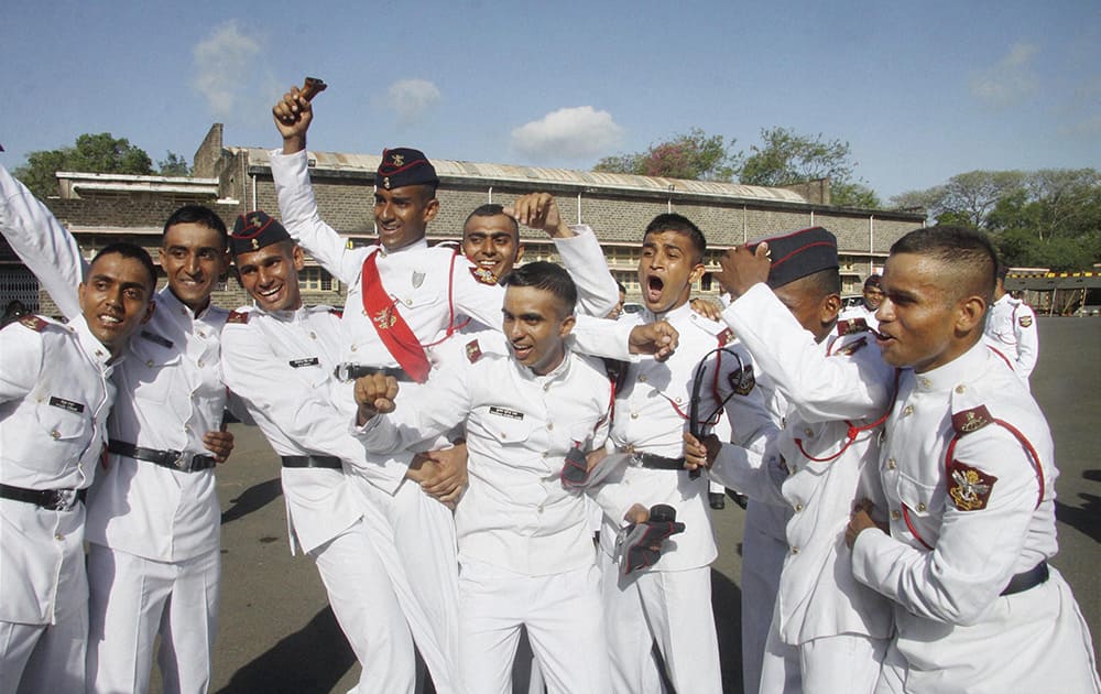 Cadets celebrate after the Passing out Parade of 130th NDA course in Khetarpal parade ground in Pune.