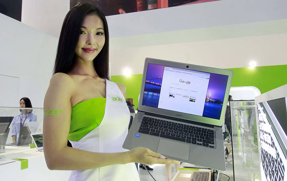 A model displays a Chromebook of Acer Inc. during the Computex Taipei exhibition at the world trade center in Taipei, Taiwan.