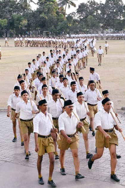 RSS volunteers take part in a march.