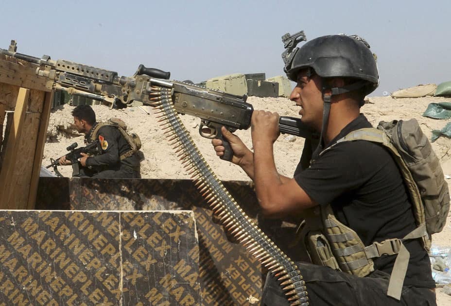 Iraqi counterterrorism forces face off with Islamic State militants in the Nuaimiya neighborhood of Fallujah, Iraq.