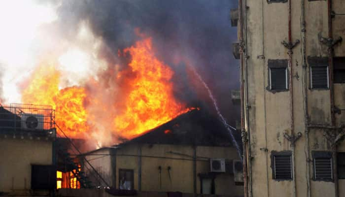 Smoke billowing out after a major fire at building on the Colaba Causeway in south Mumbai.
