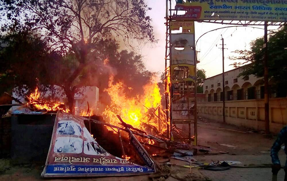 A fire break out after clashes between the police and the encroachers who were being evicted from Jawaharbagh in Mathura.