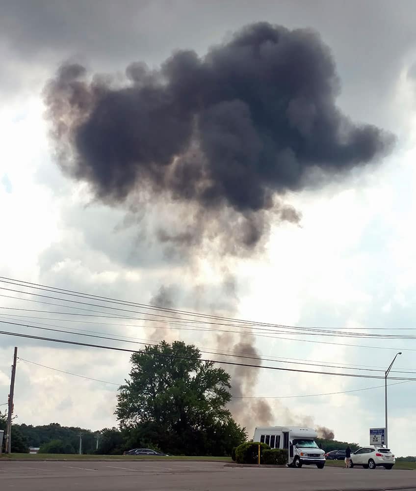 Smoke billows from the crash of a Blue Angels F/A-18 fighter jet in Smyrna, Tenn.