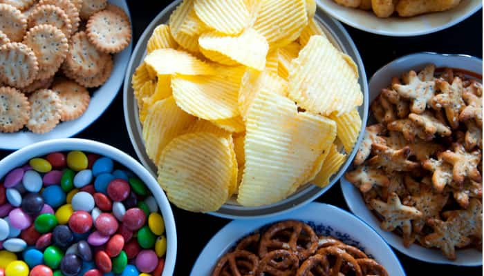 One should avoid eating processed foods as it contains high content of salt and sodium which is not good for our skin. Processed food also has a low water content.
