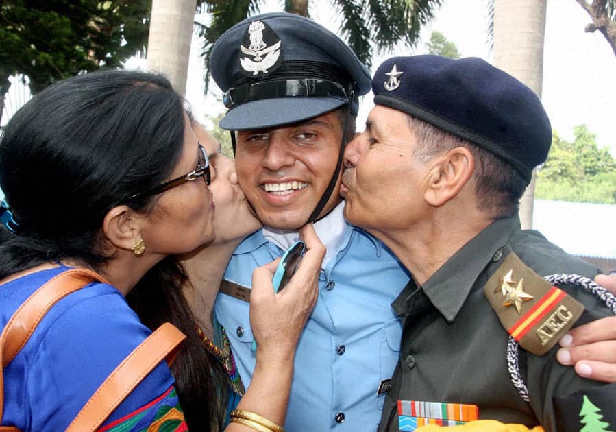 A cadet is congratulated by his parents after the Passing out Parade at Airforce Technical College in Bengaluru.