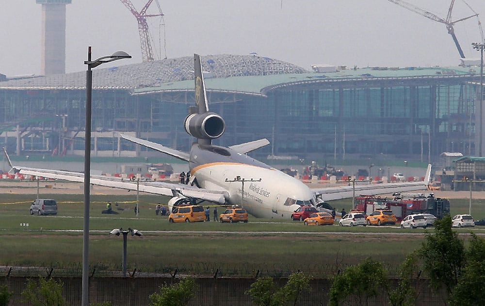 Recovery operation of a stranded UPS cargo plane is underway at Incheon International Airport in Incheon, South Korea. 