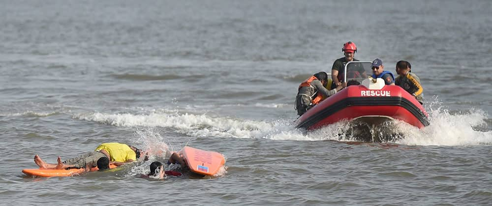 Firefighters carrying out a pre-monsoon rescue mock drill