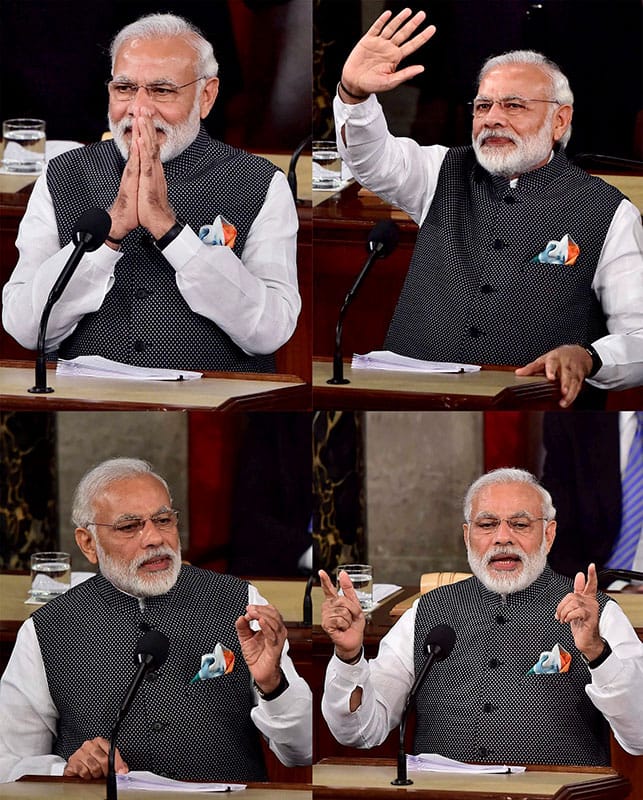 Prime Minister Narendra Modi gestures while addressing a joint meeting of Congress