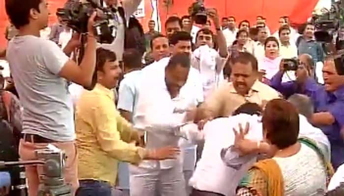 AAP councillor thrashed during MCD meeting; Kejriwal hits back, calls BJP &#039;a party of gundas&#039; - WATCH