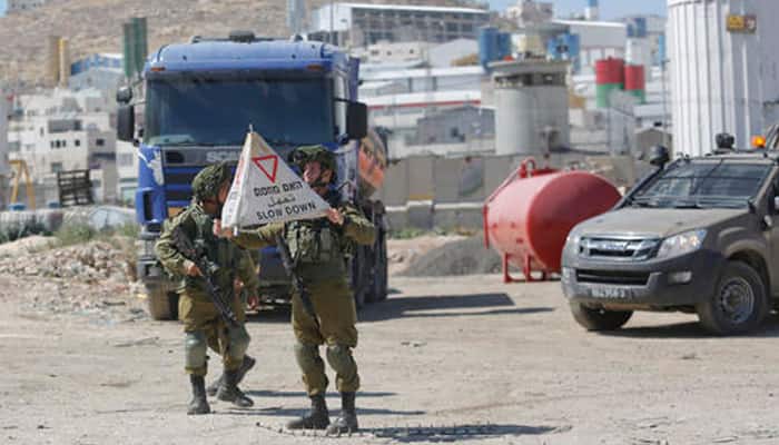 Israel bars all Palestinians after Tel Aviv attack: Army | World News ...