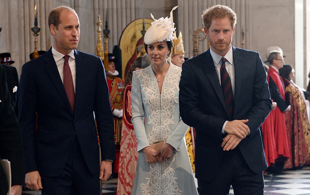 Britain's Prince William, Kate, Duchess of Cambridge and Prince Harry