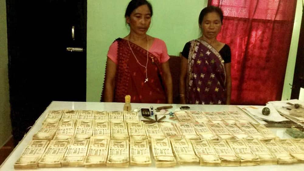 Two women arrested with huge sum of money