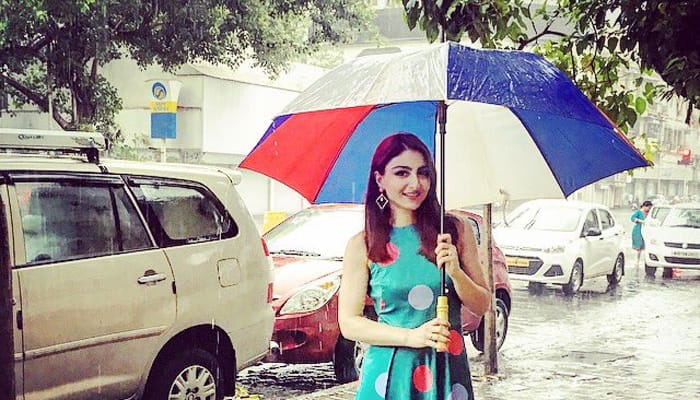 Dolled up in polka dots, Soha Ali Khan shoots in monsoon showers!