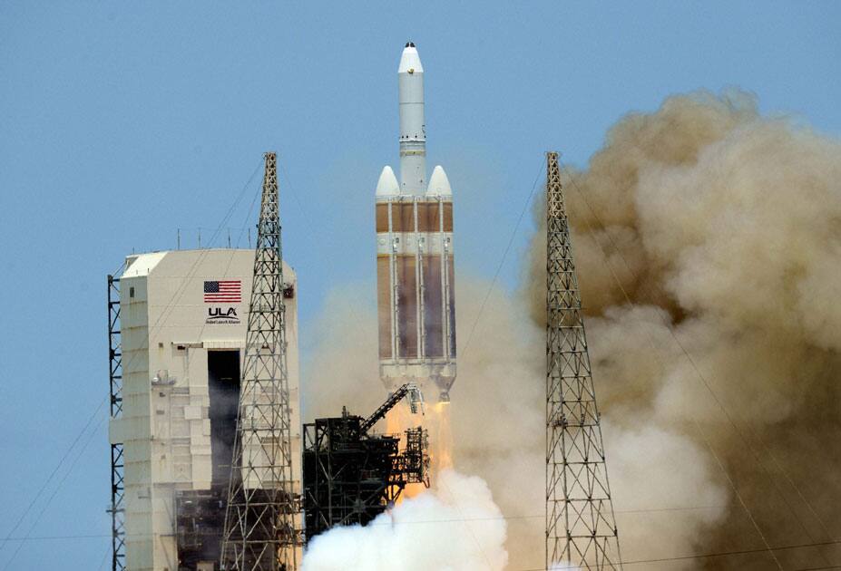 A Delta IV Heavy lifts off