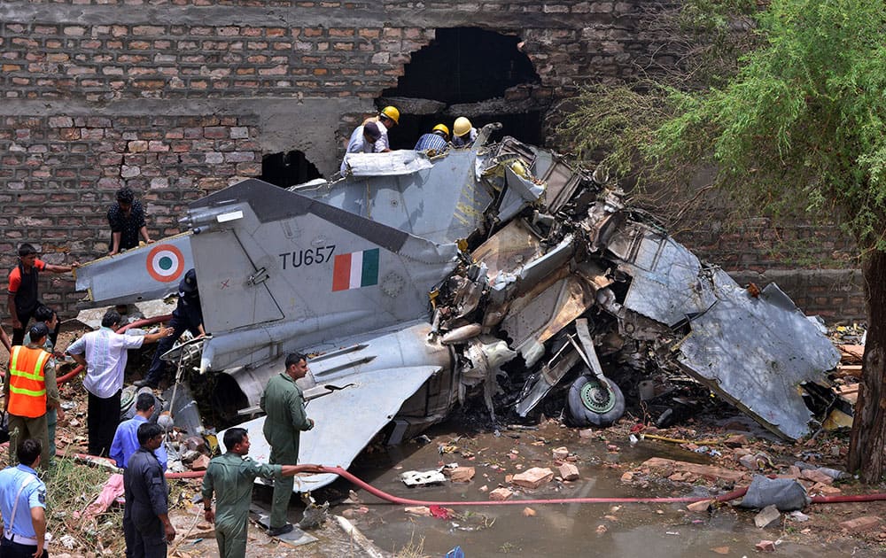 The wreckage of an Indian Air Force MiG-27 aircraft that crashed in Jodhpur