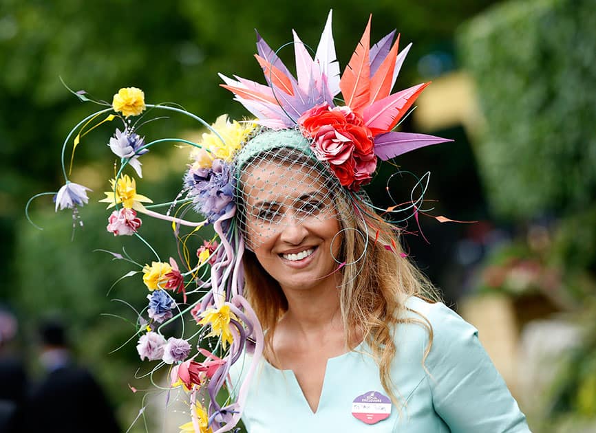 Nazer Bullen wears an ornate hat on the first day of the Royal Ascot horse race meeting at Ascot, England