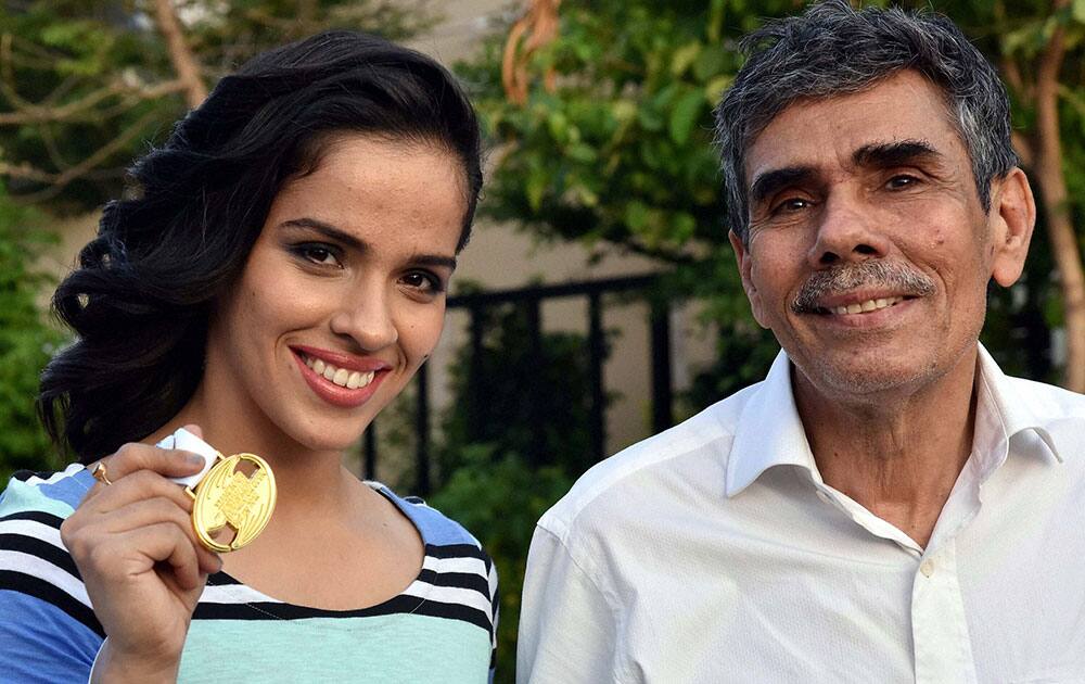 Saina Nehwal holds her medal