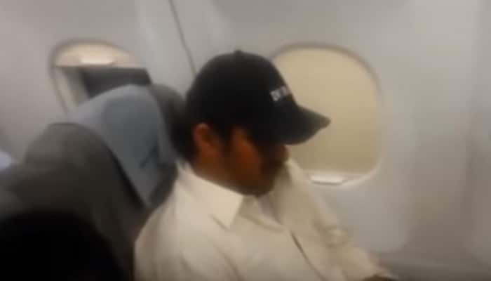 NEVER DO THIS! Man caught making MMS of air hostess in Dubai flight - WATCH what happened next