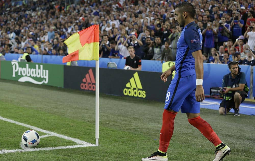 France's Dimitri Payet readies to take a corner kick during the Euro 2016