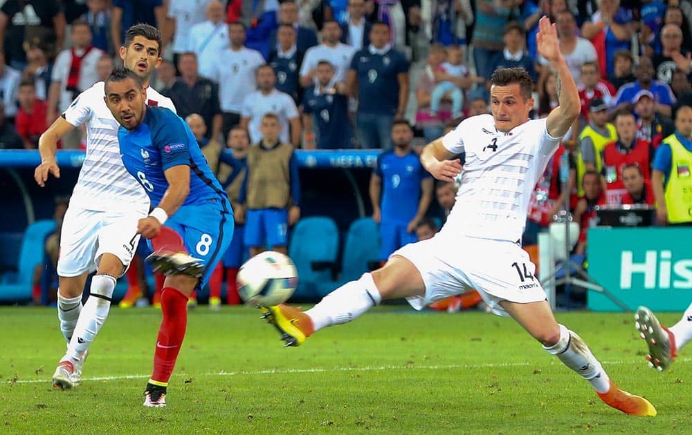 France's Dimitri Payet, scores his side's second goal during the Euro 2016