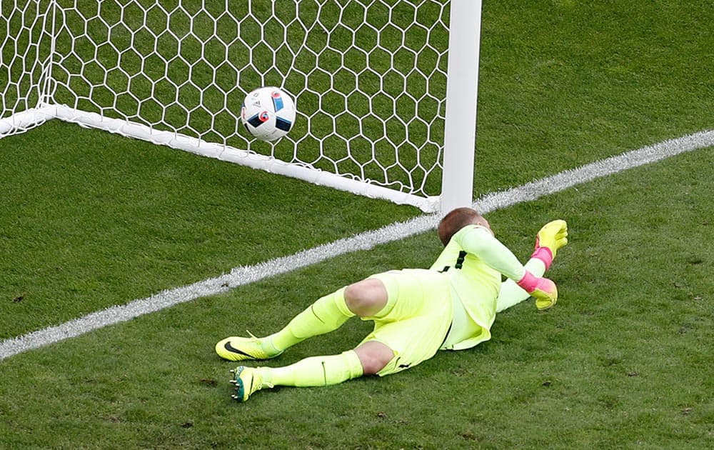 England goalkeeper Joe Hart fails to make a save as Wales' Gareth Bale scores the opening goal during the Euro 2016