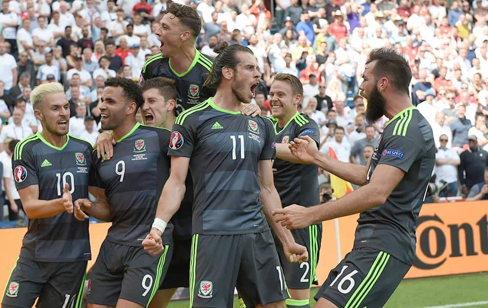 Wales' Gareth Bale celebrates after scoring the opening goal