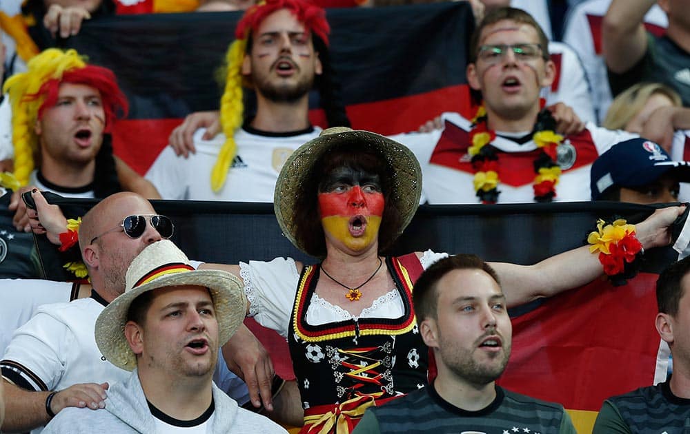 German supporters cheer on the stands during the Euro 2016 Group C soccer match 