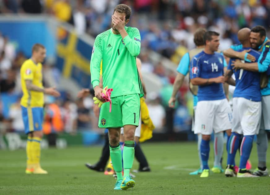 Sweden goalkeeper Andreas Isaksson leaves the field at the end of the soccer match