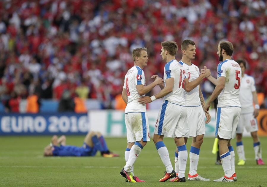 Czech Republic players celebrate at the end of the soccer match