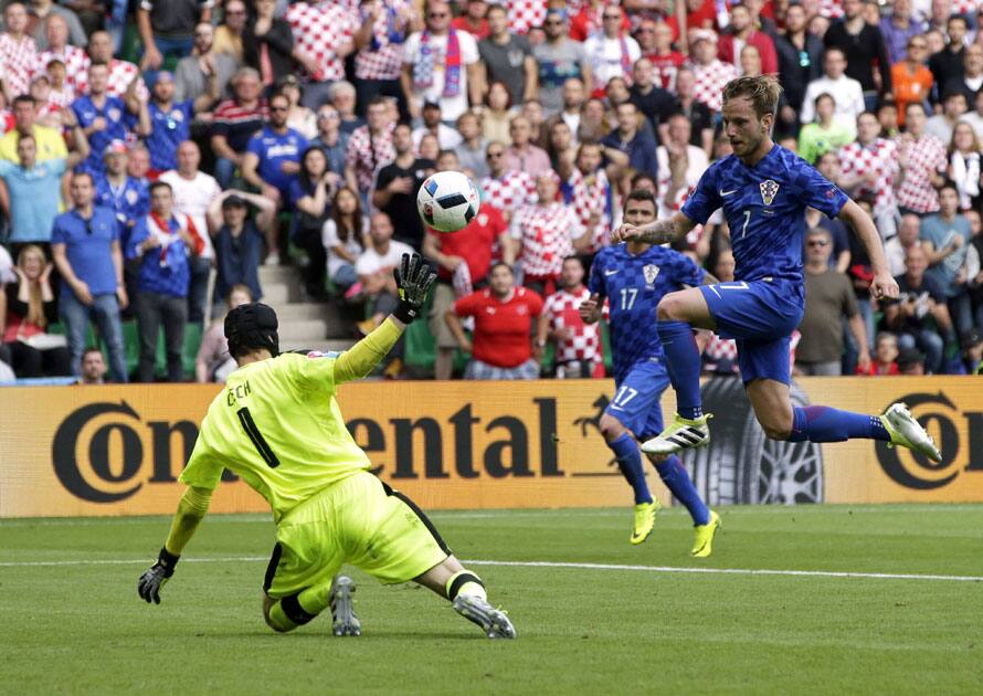  Croatia's Ivan Rakitic, right, scores his side’s second goal