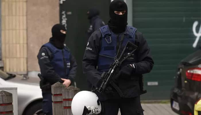 Belgium stages dozens of anti-terror raids, 12 people held