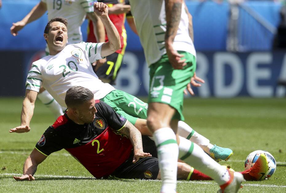 Ireland's Wes Hoolahan, left, is challenged by Belgium's Toby Alderweireld