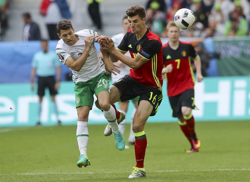 Ireland's Wes Hoolahan, left, and Belgium's Thomas Meunier go for the ball