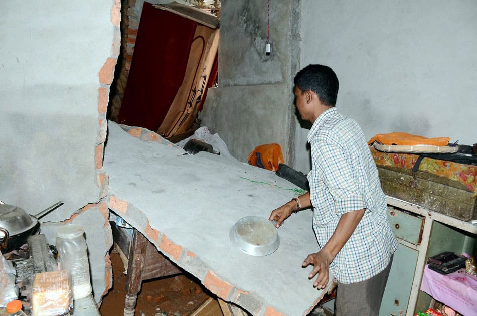 A house collapses in Guwahati.