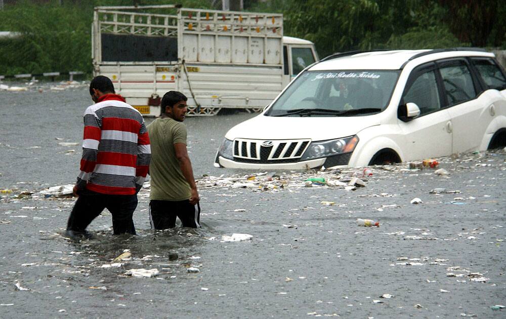 Vehicles submerge in Jammu
