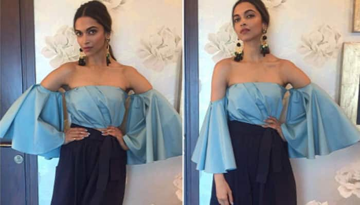 Hello hotness! Deepika Padukone looks kickass in an all blue satin grace!