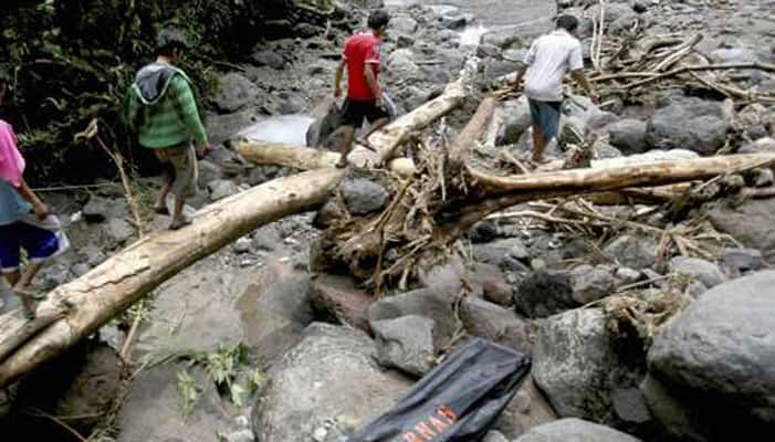Deaths in Indonesia landslides, flood rise to 56 with nine still missing