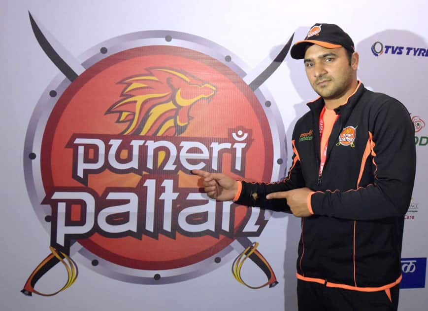 Puneri Paltan captain Manjeet Chillar poses for media