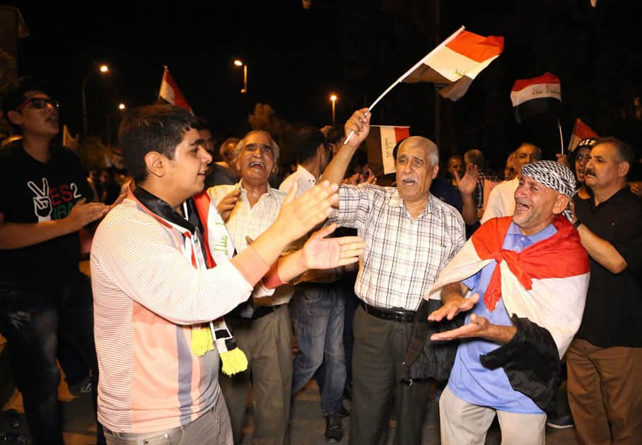 Protesters chant slogans calling for governmental reforms